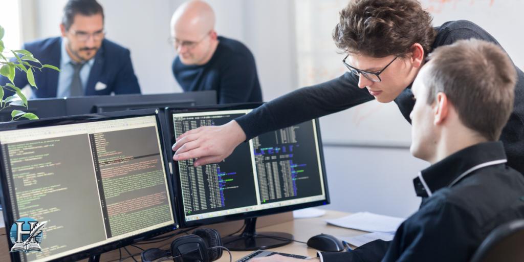 أشخاص متنوعون يعملون على الحاسوب لحل مشاكل